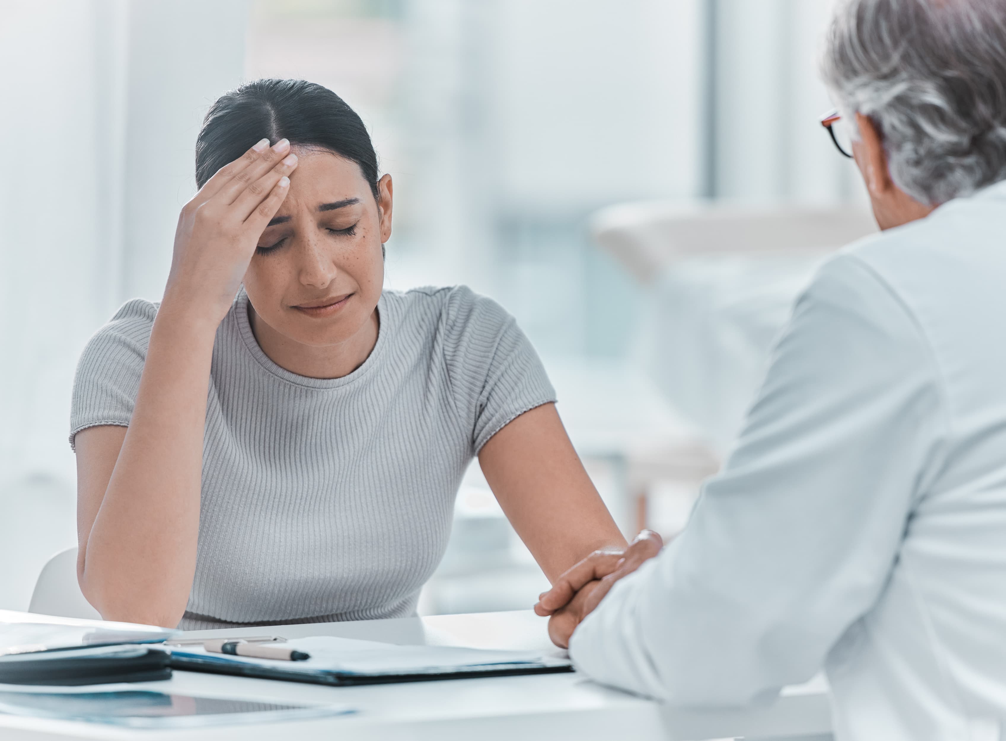 Doctor consulting with patient